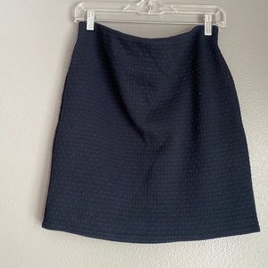 Stretchy, textured navy blue mini skirt